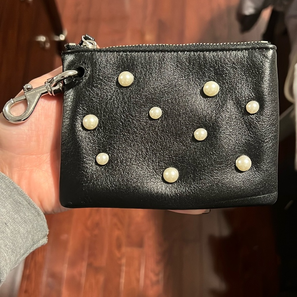 Rebecca minkoff black and pearls card holder with key chain.